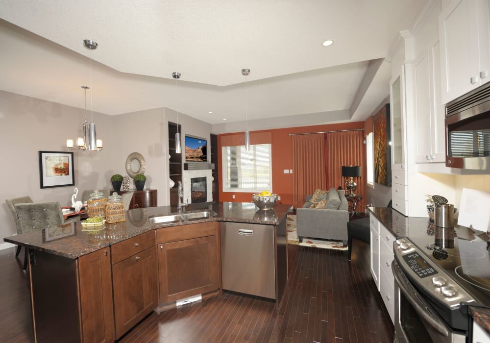 Kitchen, dining room and living room in a cottage at Touchmark at Wedgewood in Edmonton, Alberta
