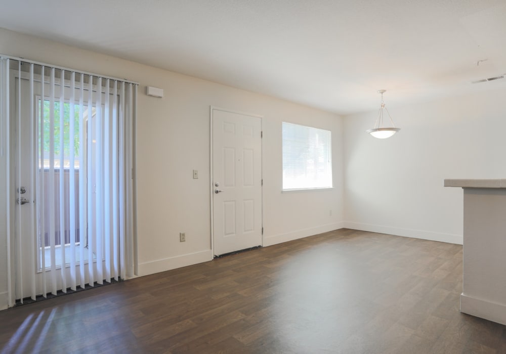 Bright bedroom with large windows at La Vina Apartments in Livermore, California,