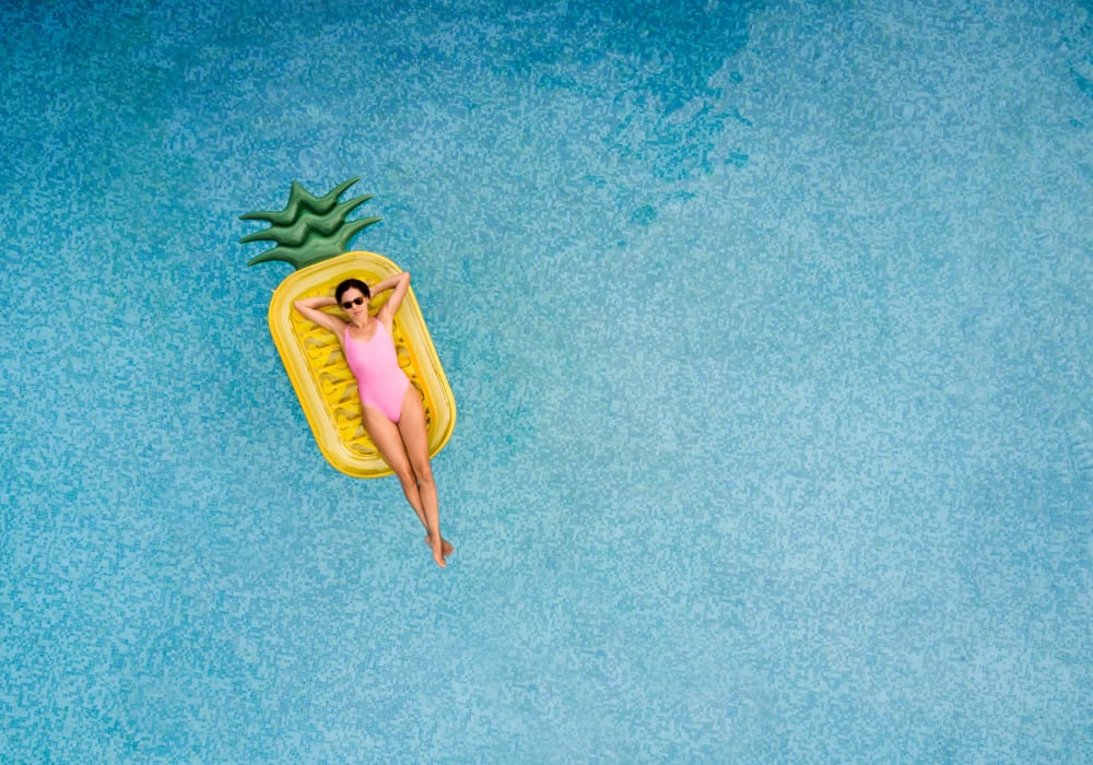 Resident floating in Ocean Park of Ponte Vedra's swimming pool in Jacksonville Beach, Florida