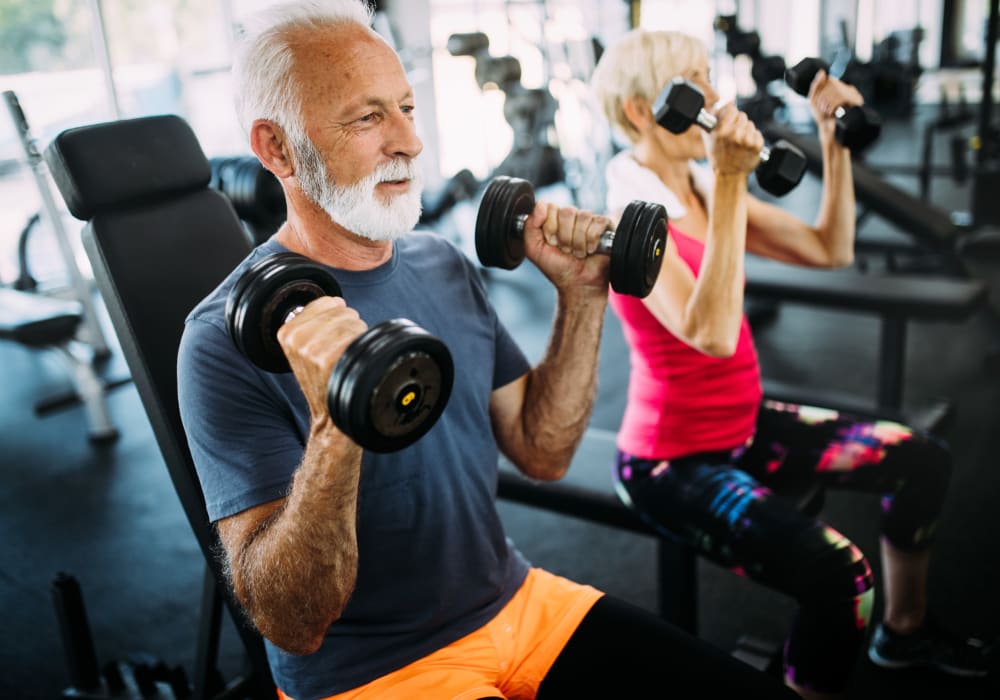 Residents lifting weights at Ocean Park of Ponte Vedra in Jacksonville Beach, Florida
