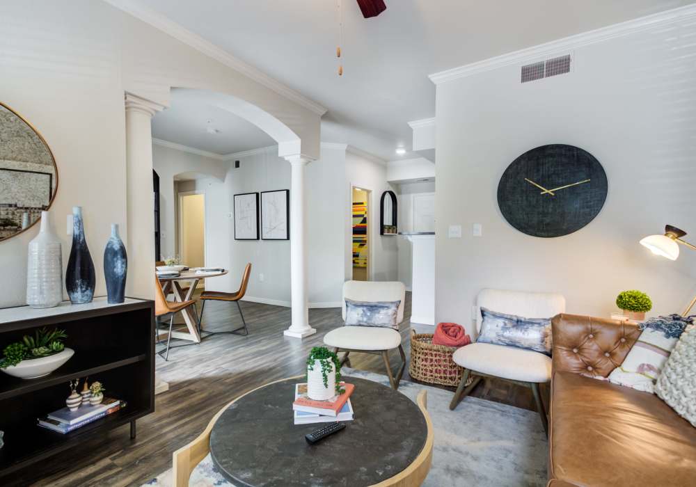 Stylish living room with large sofa and coffee-table at Irving Schoolhouse Apartments in Salt Lake City, Utah