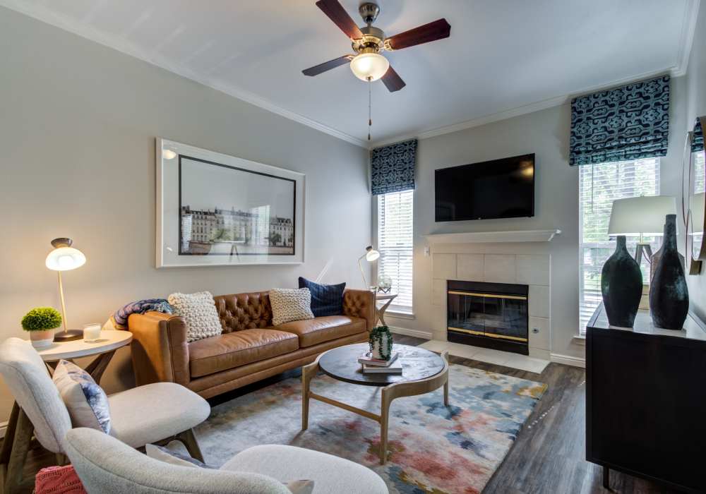 Well-furnished living room with ambient lighting at Irving Schoolhouse Apartments in Salt Lake City, Utah