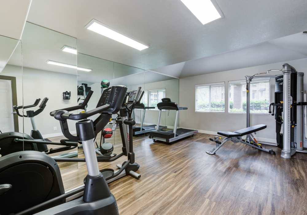 Well-equipped fitness center at Seapointe Villas in Costa Mesa, California