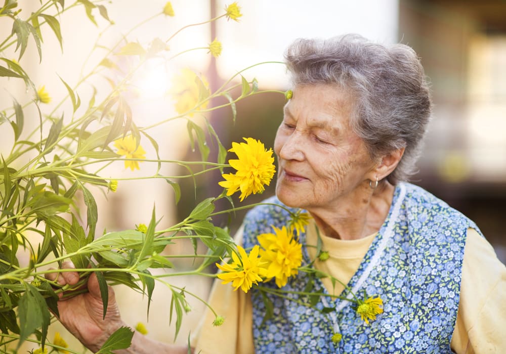 Memory Care resident gardening at Autumn Grove Cottage at Katy in Katy, Texas
