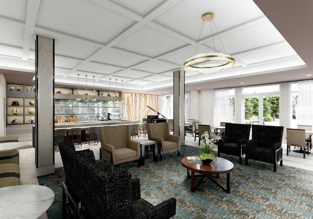 Clubhouse lounge area with a bar for residents at Sonrisa Assisted Living and Memory Care in Roseville, California