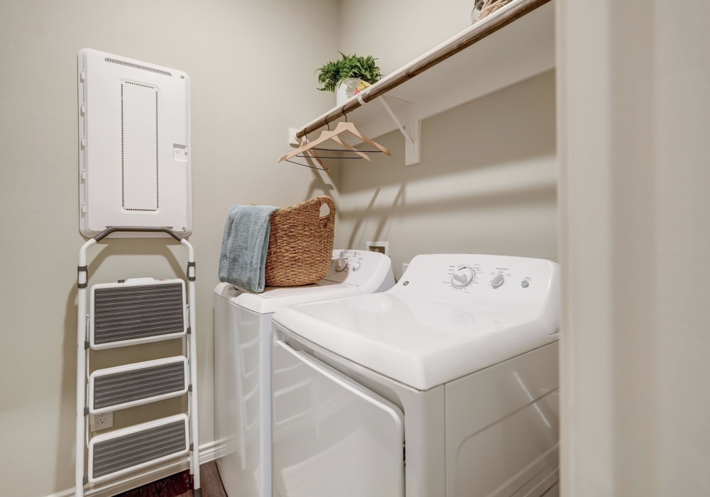 Washer and dryer in your home at BB Living Harvest in Argyle, Texas