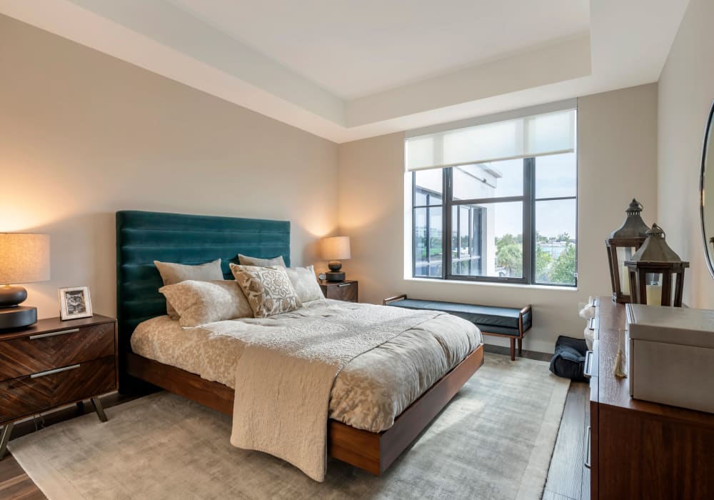 Model bedroom with large windows at Motif in Fort Lauderdale, Florida