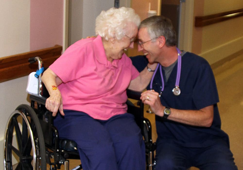 Resident and caregivers at Maple Ridge Care Center in Spooner, Wisconsin