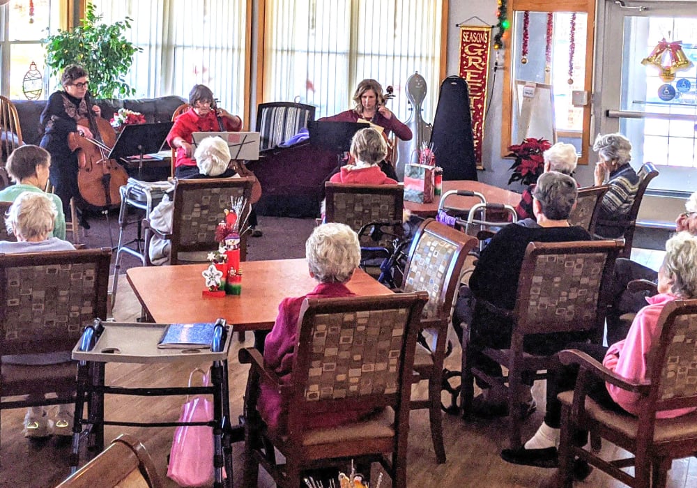 Residents enjoying a concert at Wellington Place at Hartford in Hartford, Wisconsin