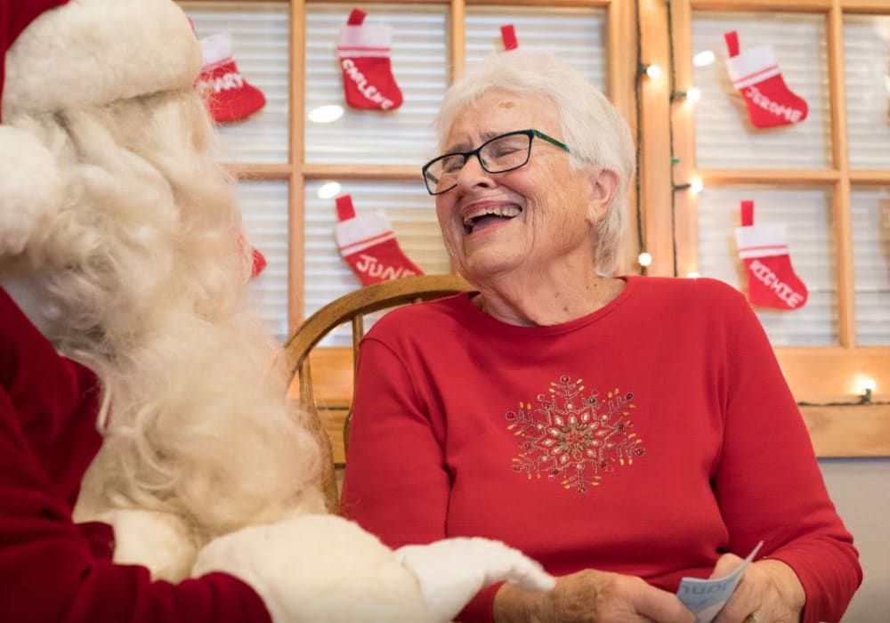 Resident visiting with Santa at Wellington Place at Whiting in Stevens Point, Wisconsin