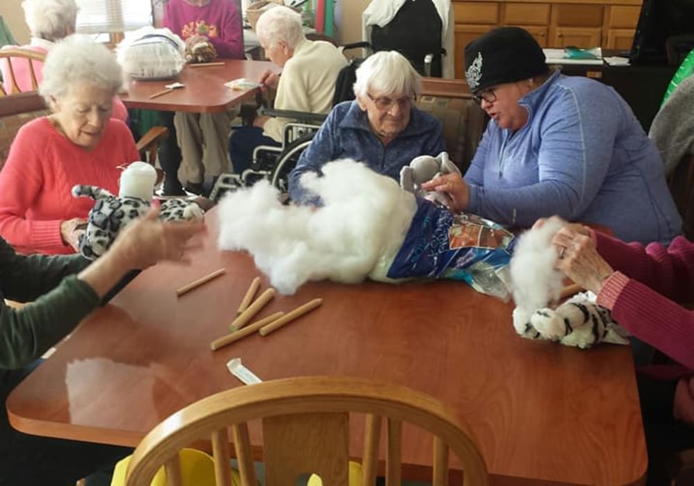 Residents making stuffed animals at Wellington Place at Whiting in Stevens Point, Wisconsin