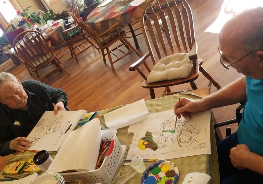 Residents painting at Wellington Place at Whiting in Stevens Point, Wisconsin
