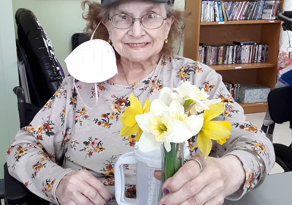 Resident holding flowers at Ingleside Communities in Mount Horeb, Wisconsin