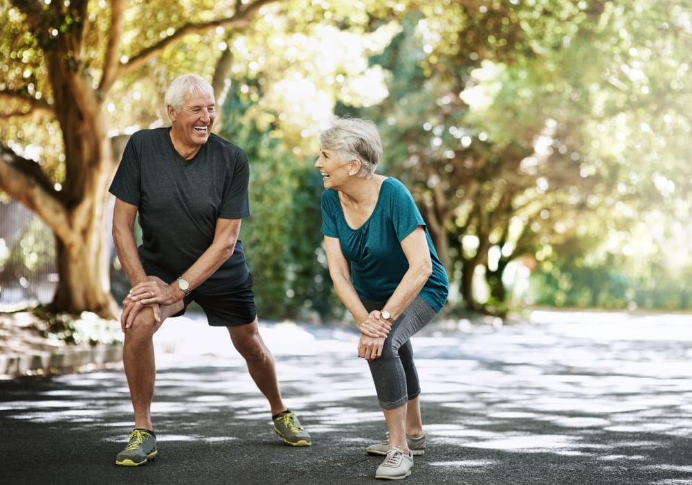 Residents stretching outside at The Village of the Heights in Houston, Texas