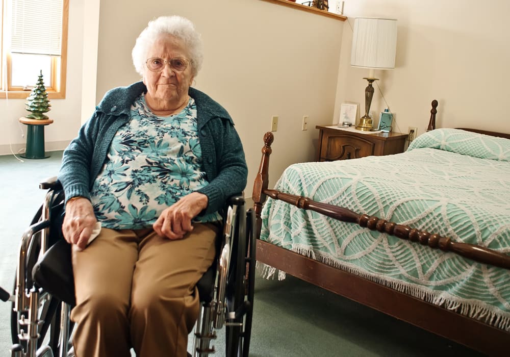 Resident relaxing in an apartment at Wellington Place at Rib Mountain in Wausau, Wisconsin