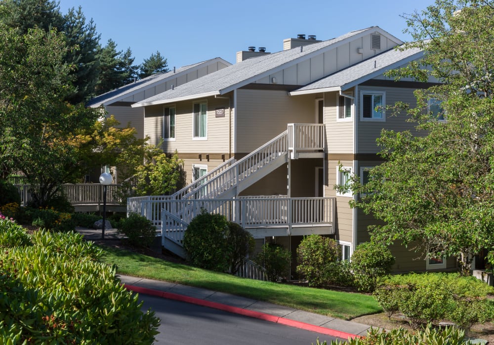 Residents filling out a form on our website from a mobile device in their home at Skyline at Murrayhill in Beaverton, Oregon