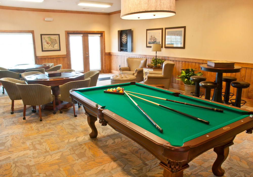 The community billiards table in the resident lounge at Mariposa at Bay Colony in Dickinson, Texas