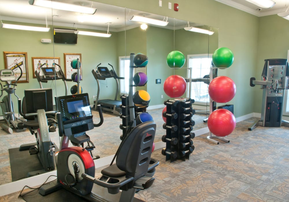 Fitness equipment in the onsite gym at Mariposa at Bay Colony in Dickinson, Texas