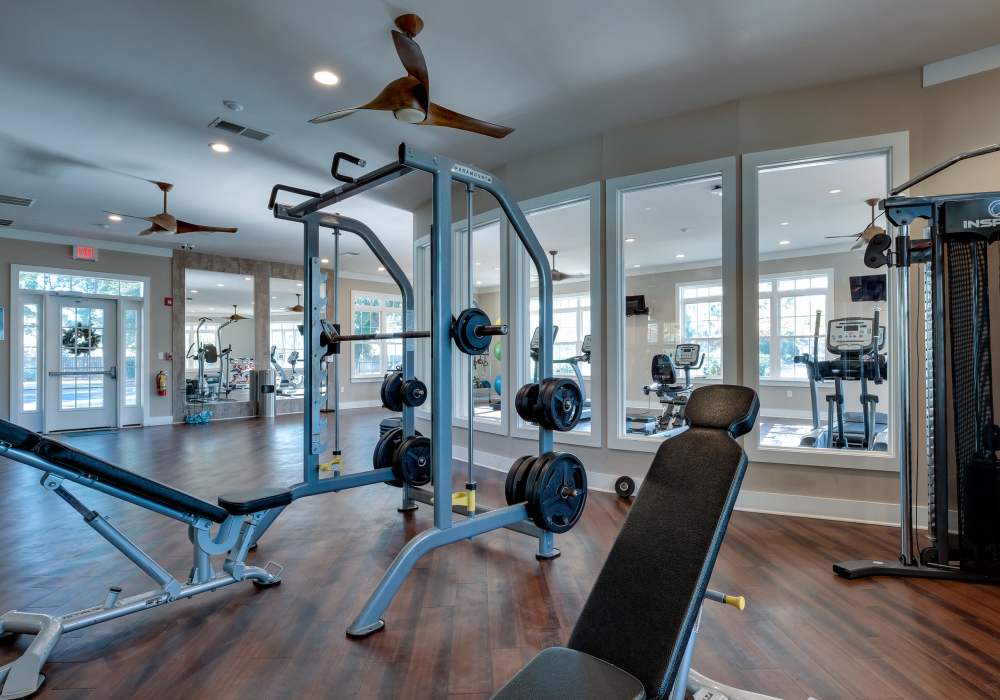 Fitness center with cardio and strength machines at Parc at Broad River in Beaufort, South Carolina