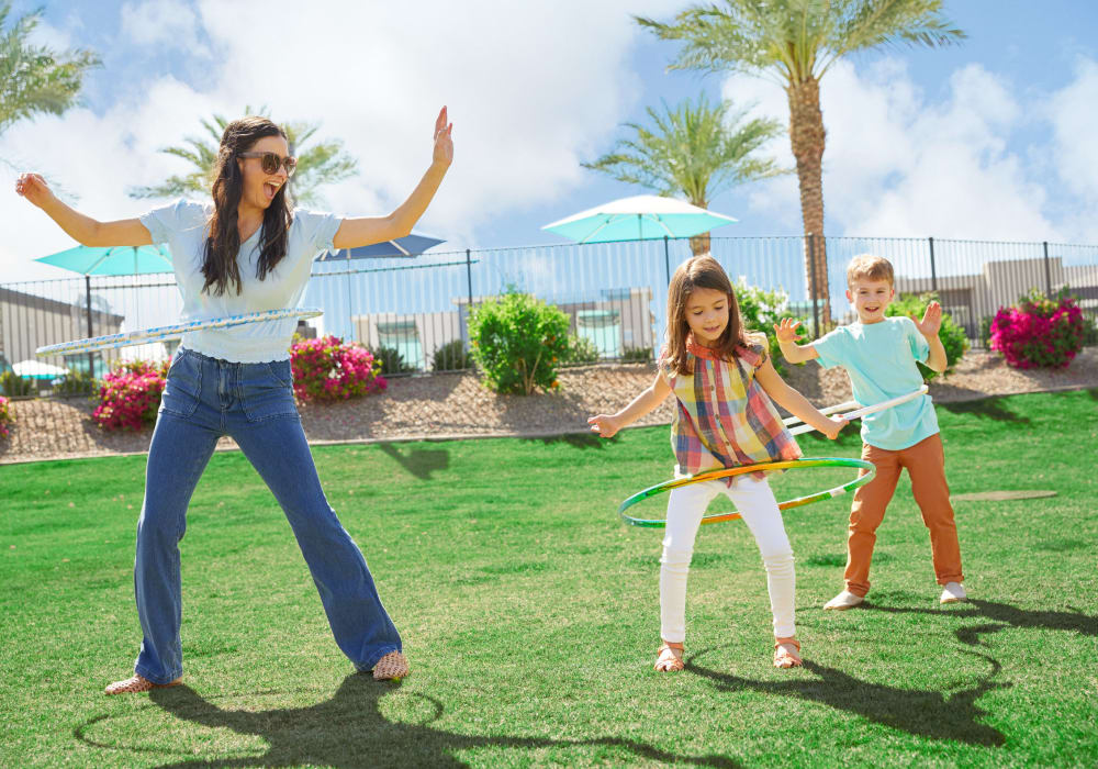 Happy family at park near BB Living at Val Vista in Gilbert, Arizona