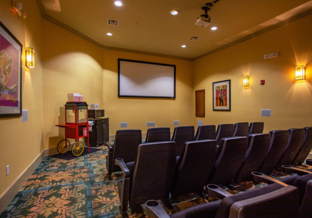 Seating in an onsite theater for residents at Mariposa at Ella Boulevard in Houston, Texas