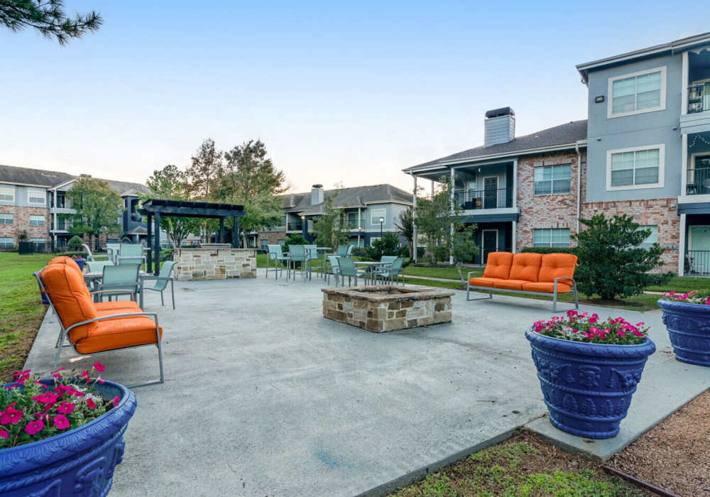 Fire pits with seating area at Hollister Place Apartments in Houston, Texas