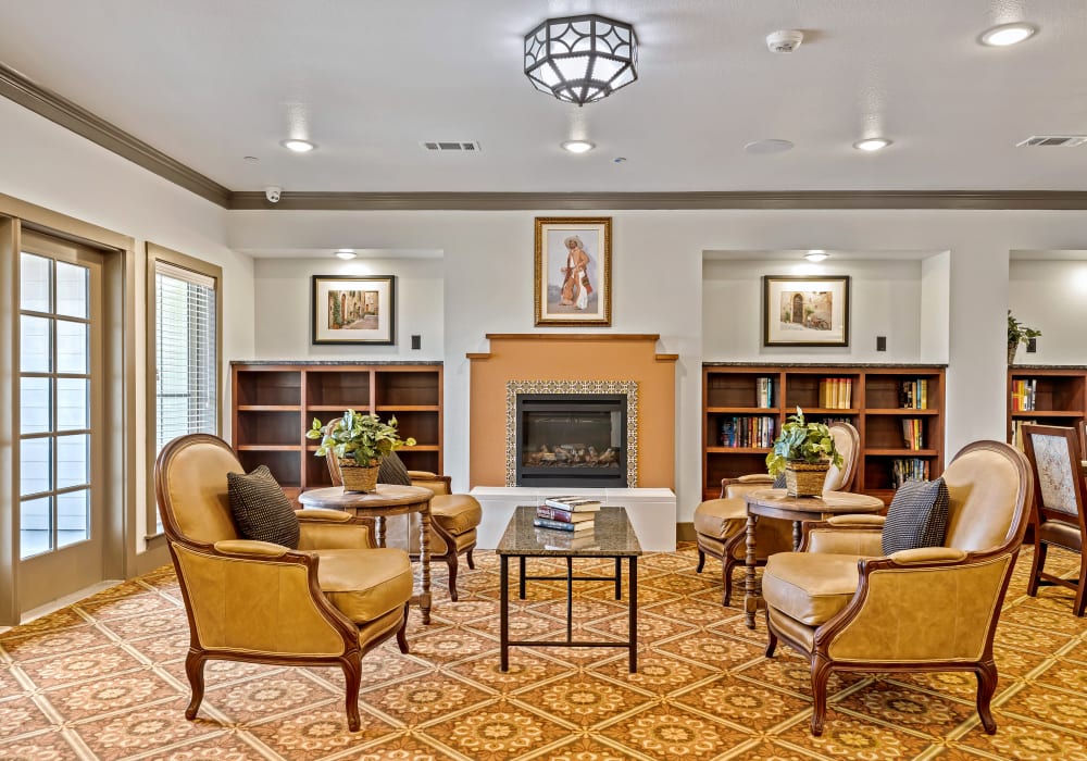 Relaxing Library with fireplace at Mariposa at Harris Road in Arlington, Texas