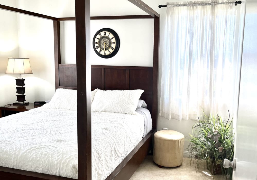 Master bedroom at Peppertree Place Apartments in Riverside, California