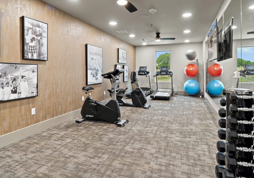 Fitness center with modern equipment at The Preserve at Willow Park in Willow Park, Texas