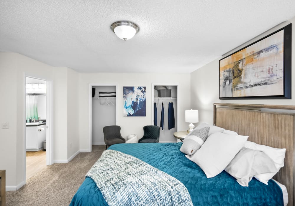 Bedroom with ample closet space at The Isle Apartments in Orlando, Florida