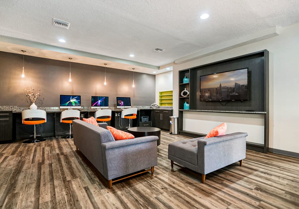 Community lounge with tv at Park Avenue in Jacksonville, Florida