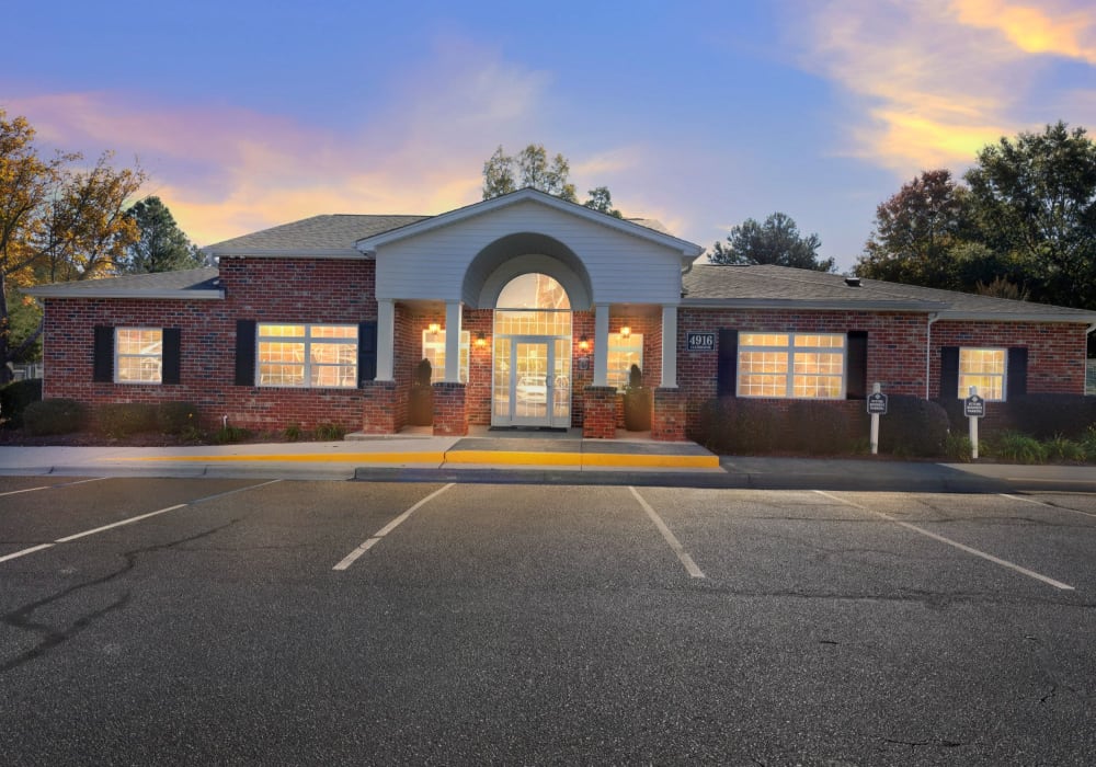 Leasing office at dusk at Featherstone Village in Durham, North Carolina