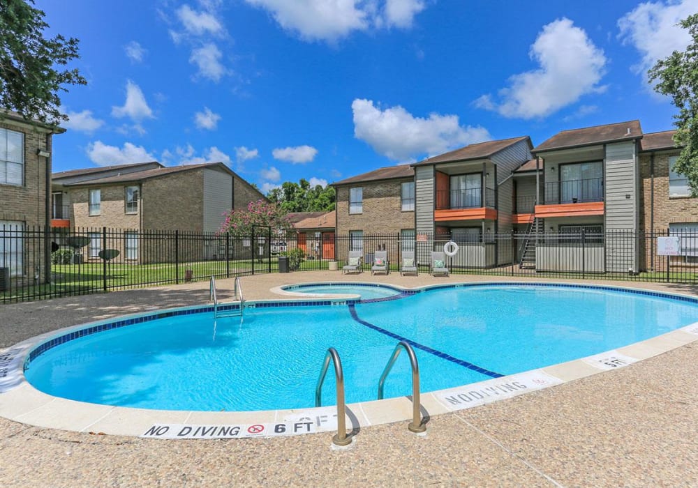 Sparkling swimming pool at CrescentWood Apartments in Clute, Texas