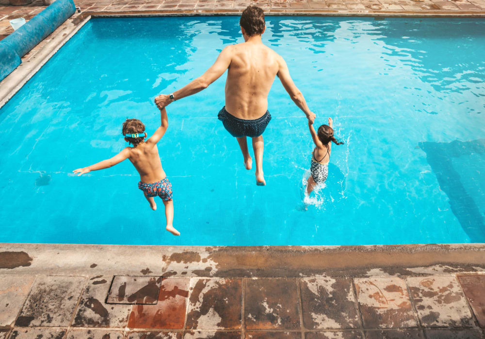 Family enjoying the pool at Verano in Perris, California