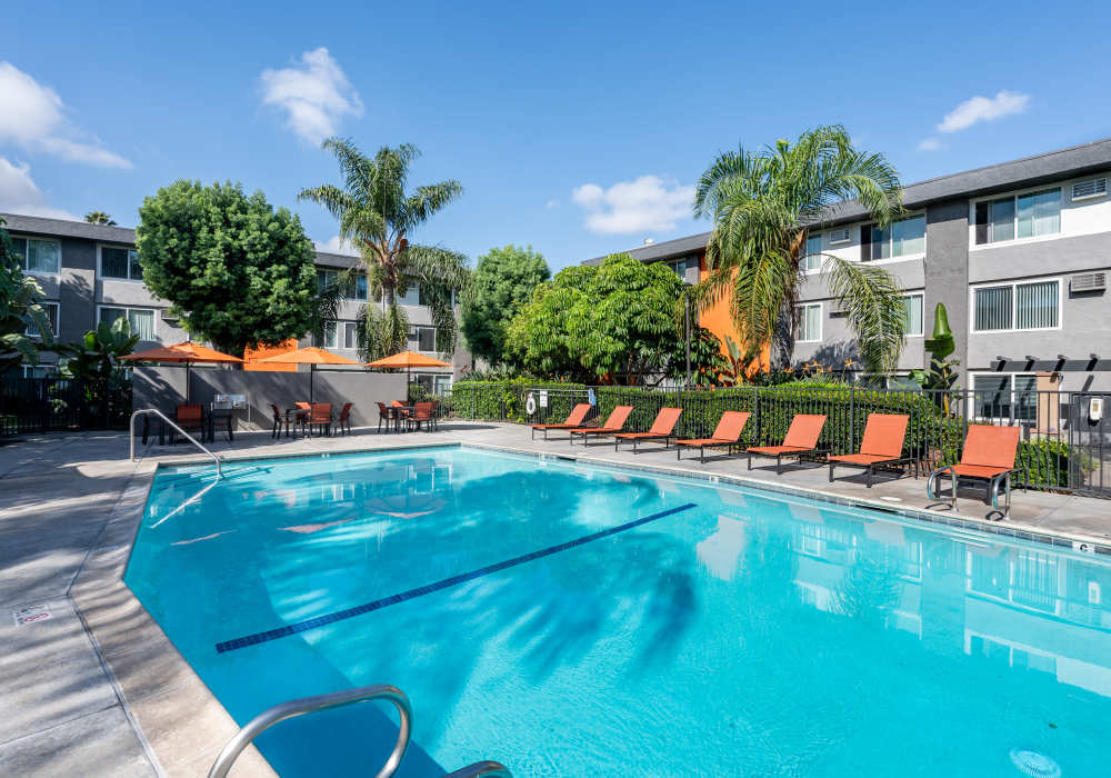 Resort-style swimming pool at UCA Apartment Homes in Fullerton,California