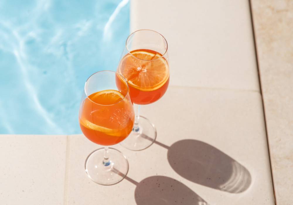 Close up of orange juices on poolside at City View Apartments in Nashville, Tennessee