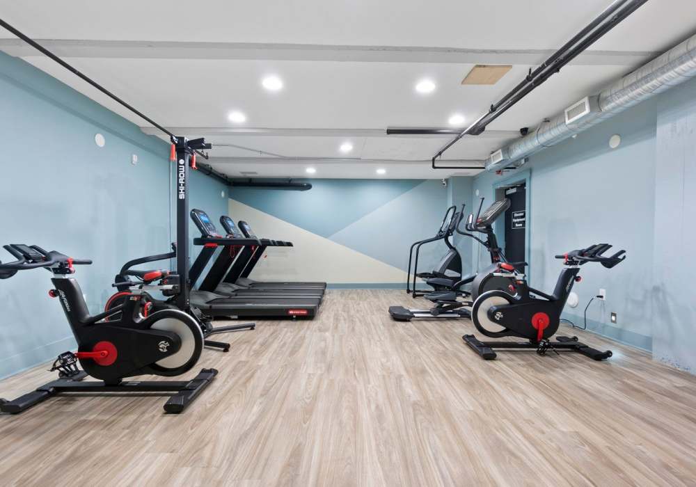 Exercise equipment available in our fitness center at Perry Street Lofts in Petersburg, Virginia