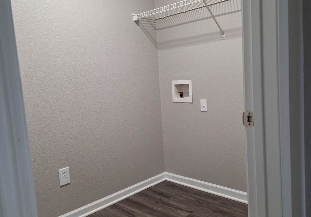laundry room with w/d hookups and ample storage at River Landing in Myrtle Beach, South Carolina