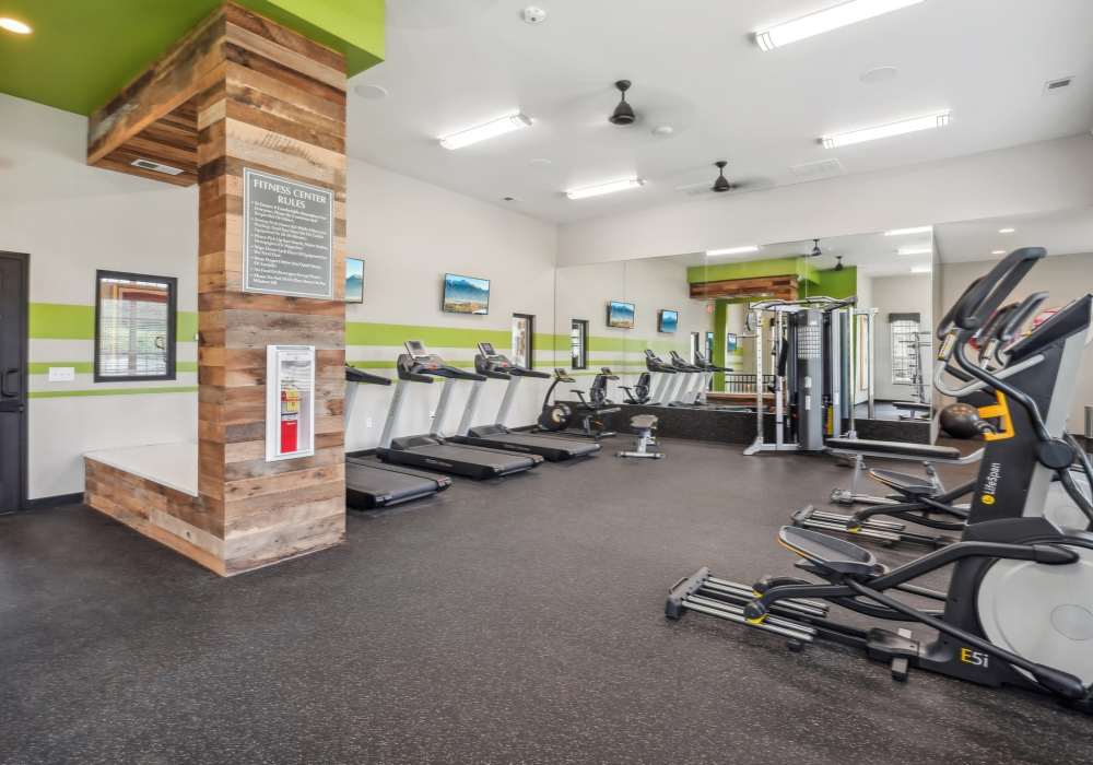 Fitness center open 24 hours with treadmill and weights at The Cascades in Antioch, Tennessee