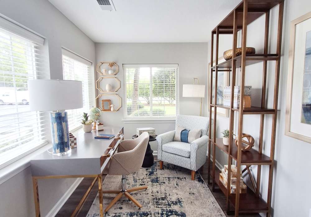 Well lit bedrooms with plush carpeting spacious closets, ceiling fan, and connected bathroom at River Landing in Myrtle Beach, South Carolina