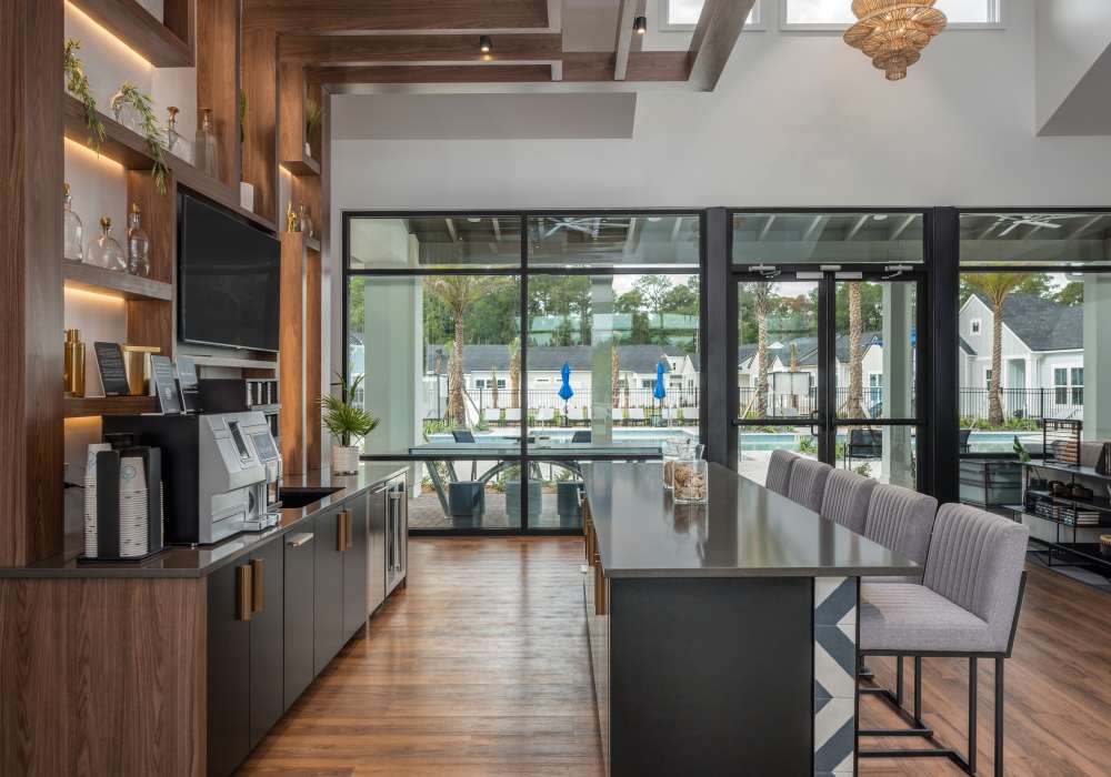 Clubhouse coffee station with bar seating at Cottage Street at eTown in Jacksonville, Florida