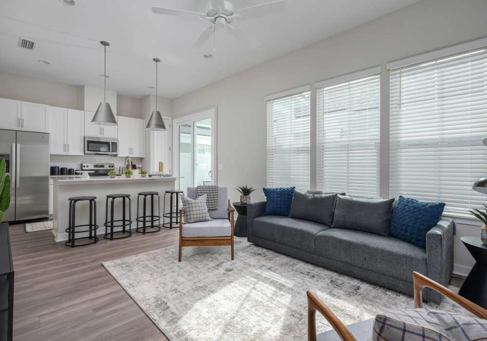 Spacious living room with wood flooring at Cottage Street at eTown in Jacksonville, Florida