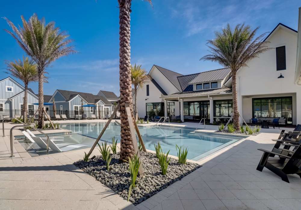 Swimming pool and apartments at Cottage Street at eTown in Jacksonville, Florida