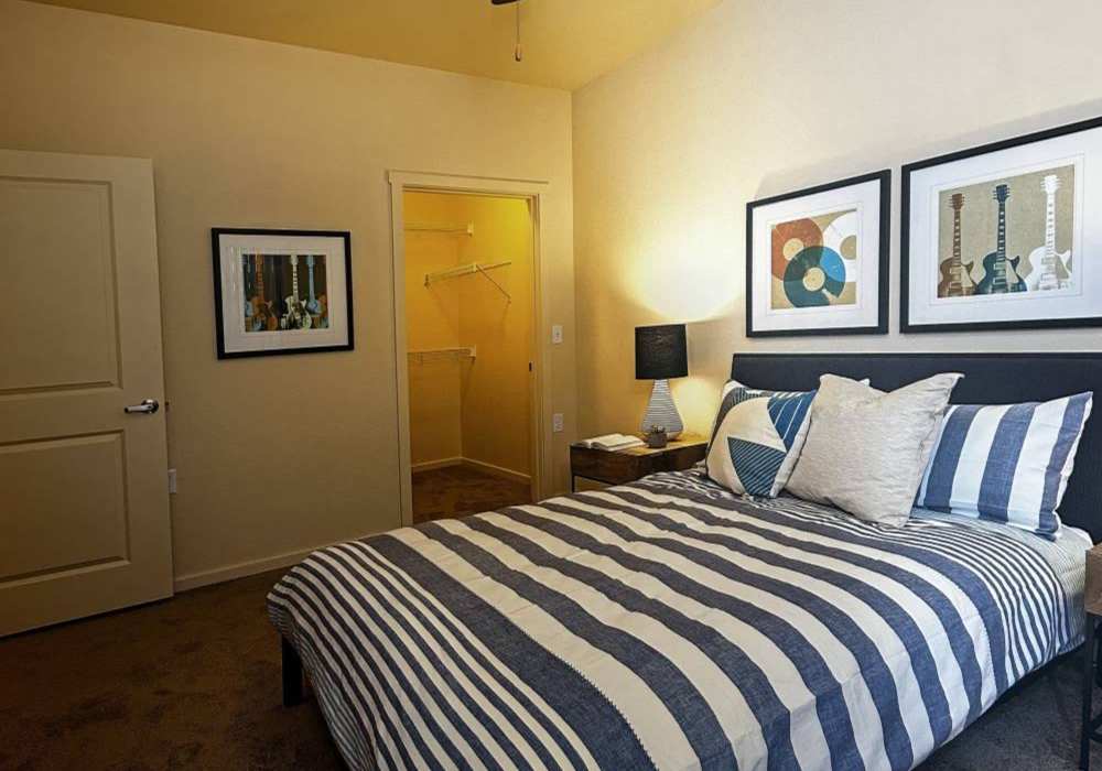 Spacious bedroom with large comfortable bed at Copper Wood in Lacey, Washington
