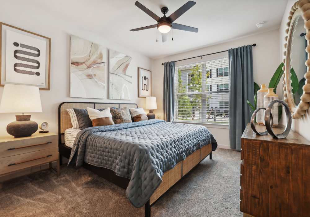 Furnished bedroom at The Southerly at Orange City in Orange City, Florida