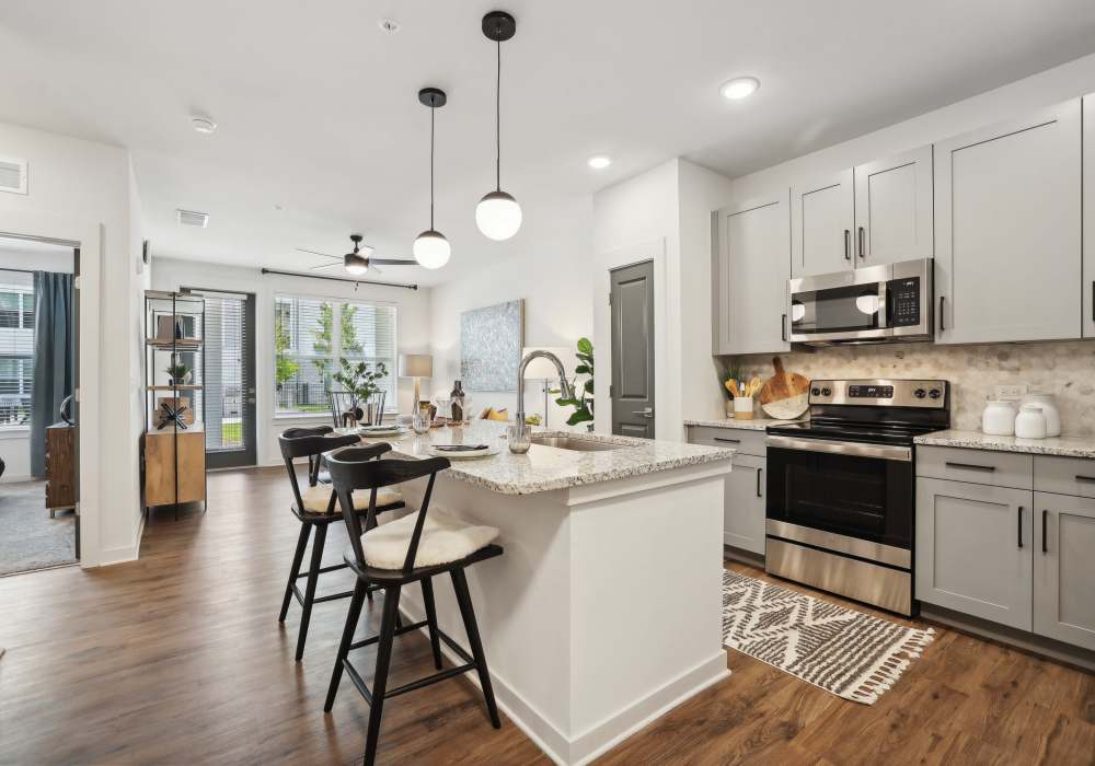 Living area in a furnished model apartment at The Southerly at Orange City in Orange City, Florida