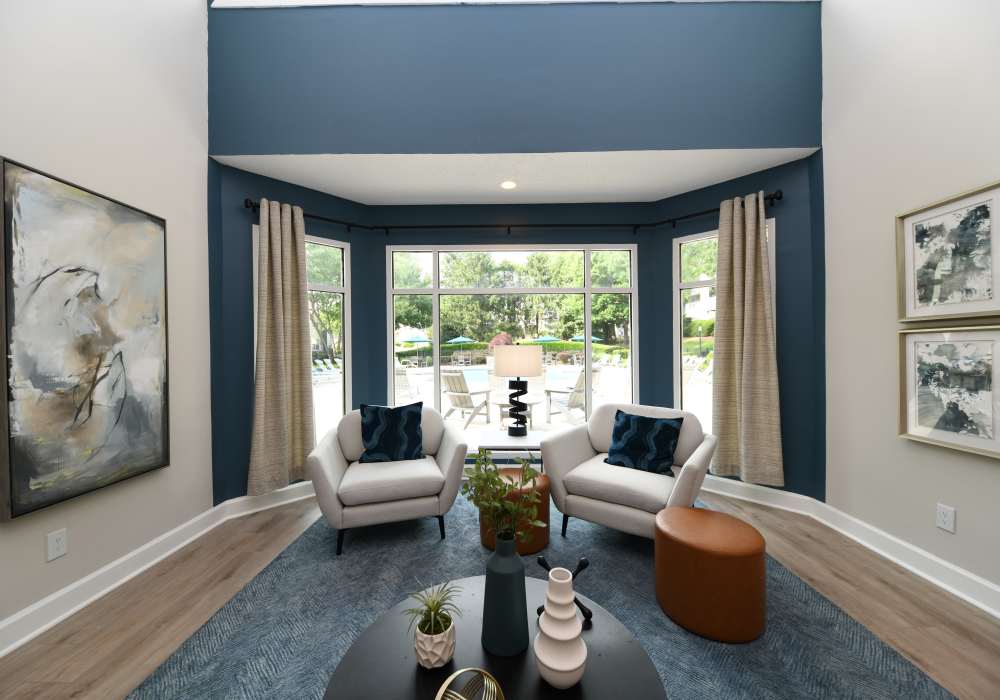 Beautiful lounge with art on the walls at Nova at Biltmore Park in Arden, North Carolina