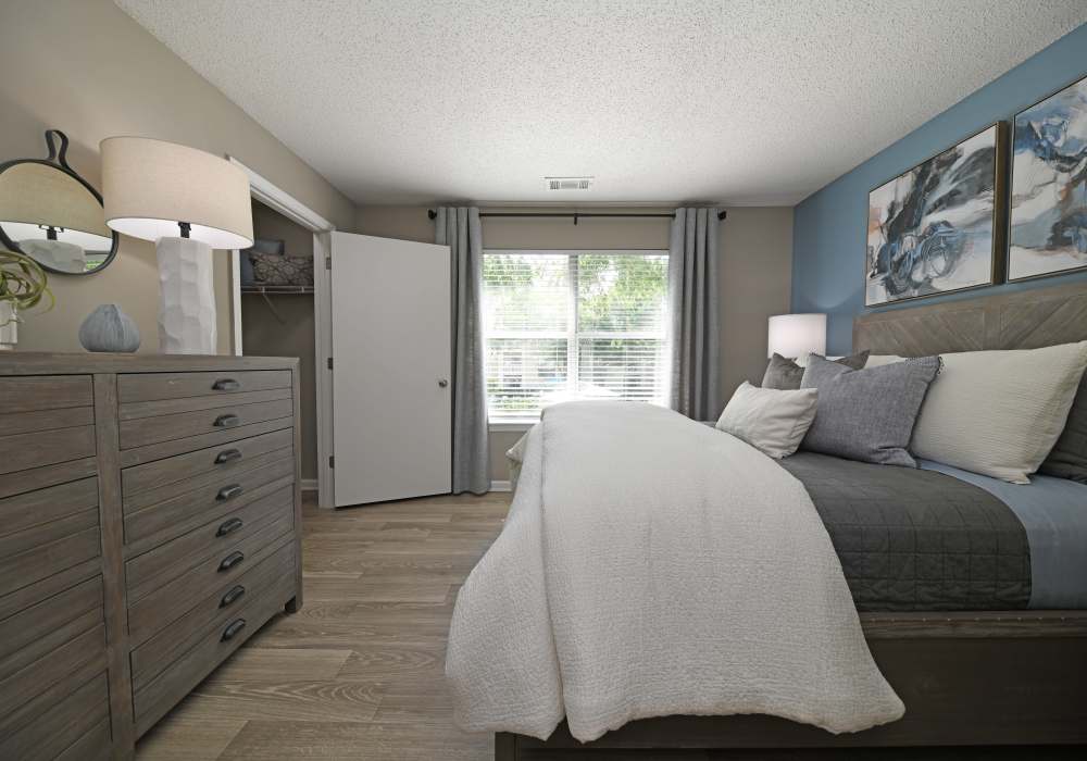 Bedroom with wood flooring at Nova at Biltmore Park in Arden, North Carolina