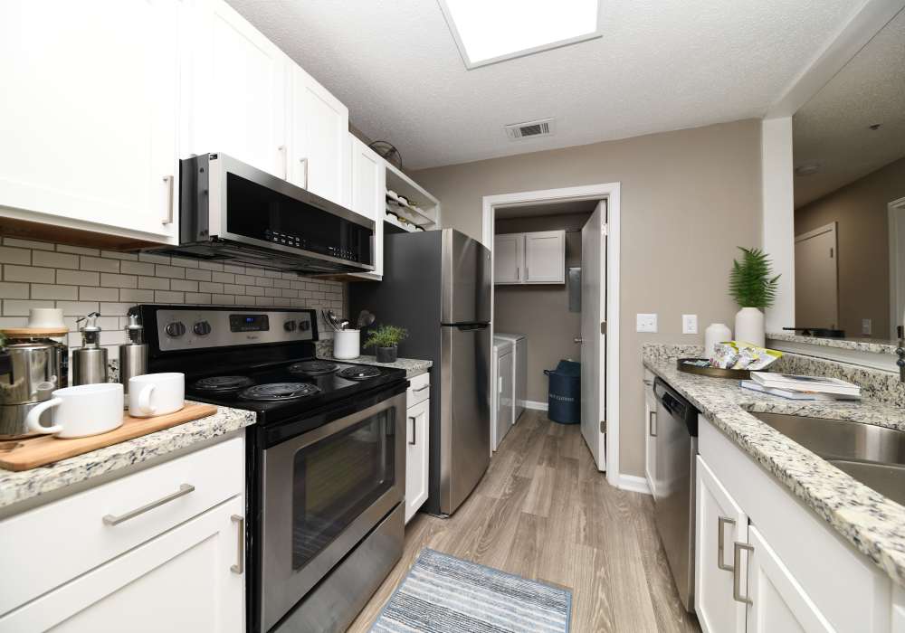 Kitchen in a furnished model apartment at Nova at Biltmore Park in Arden, North Carolina