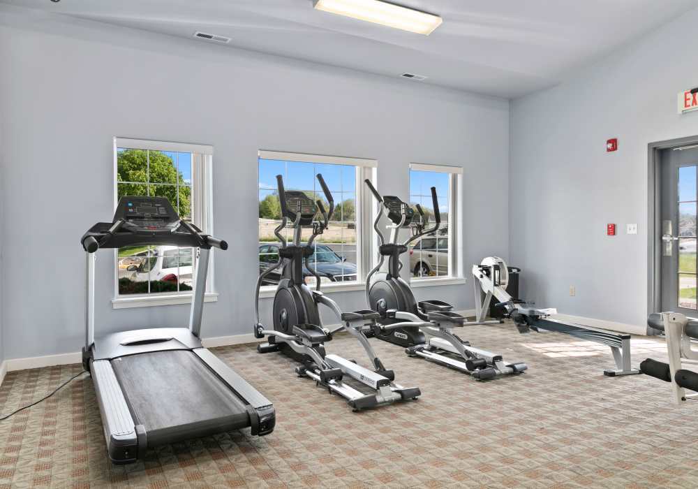 well equipped gym at Heron Creek Apartments in Moses Lake, Washington
